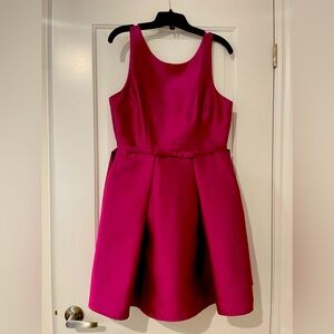 Fuchsia evening dress with pockets. Size M but fits more like L. Cute and girly
